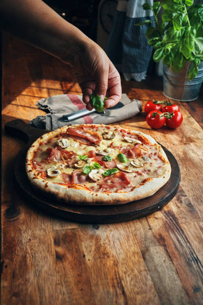 istock Pizza with Prosciutto Cotto Ham and Mushrooms 2185445006