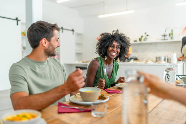 istock Diverse Duo Savoring Cuisine at Indian Cooking Workshop 2185448258