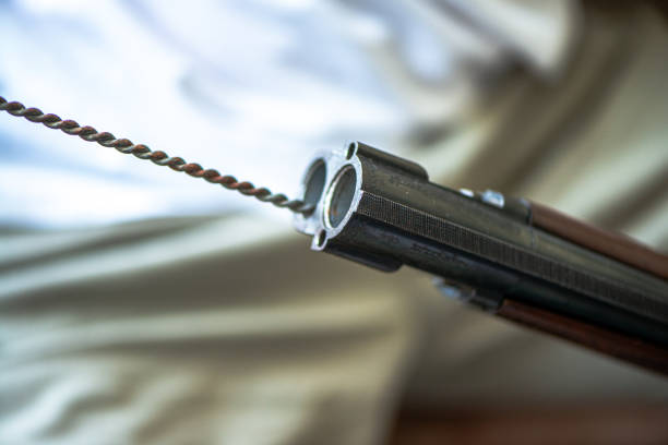 Pistol with smoking barrel in detail