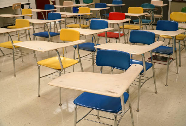 istock Close up on tables and chairs in the classroom 2185451245