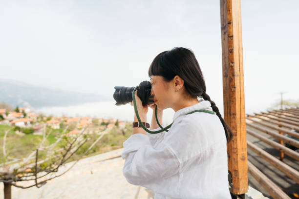 istock Female photographer 2185455779