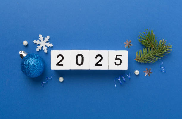 istock 2025 with confetti and decor on color background, top view 2185456694