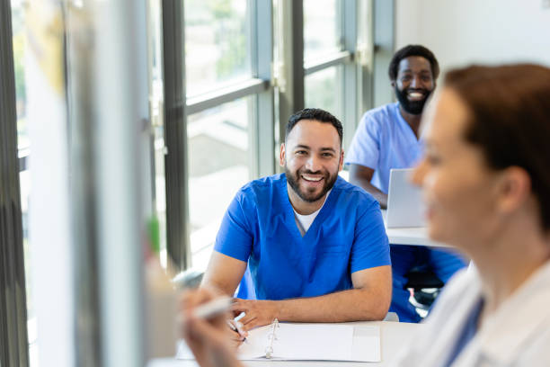 istock Attentive diverse medical students listening to professor 2185457598