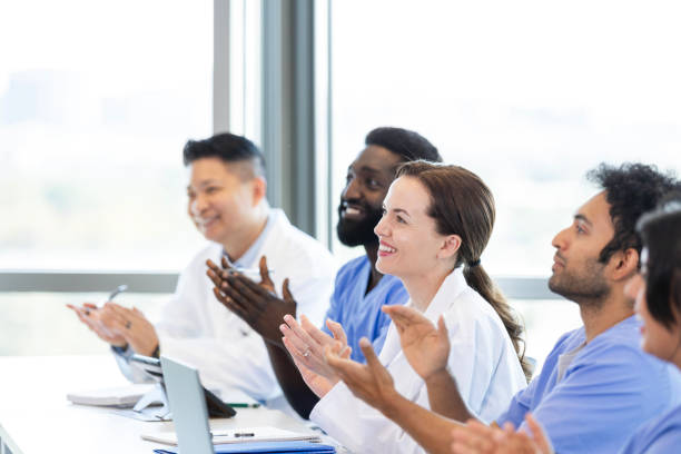 istock Medical seminar attendees appreciate the guest speaker 2185457637