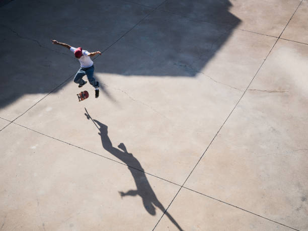 istock Skateboarder performing a high jump 2185465289