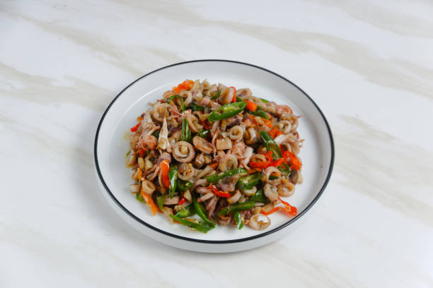 istock stir-fried salted squid with green chili. 2185468661