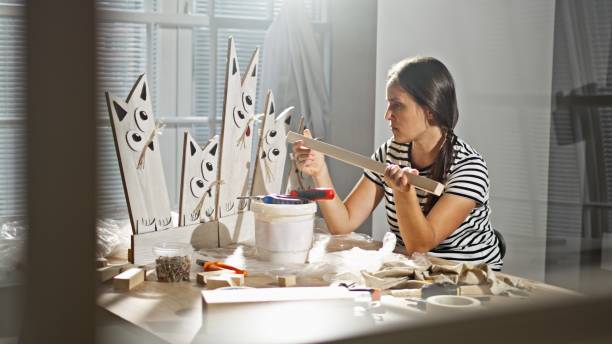 istock Artist Doing Woodworking Project With Joy. Art & Craft. 2185472821
