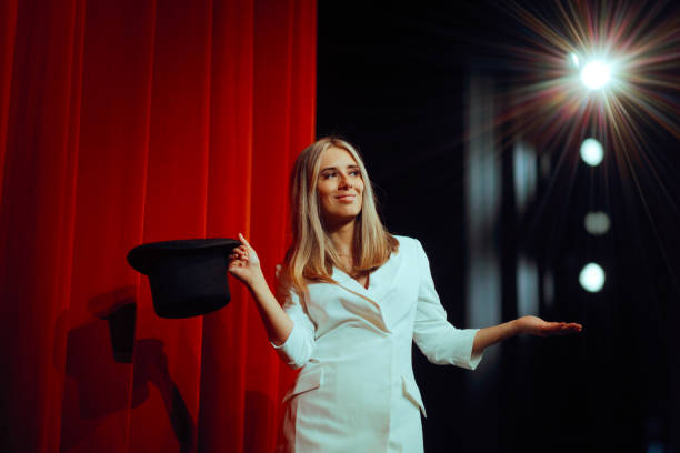 Lady Magician Holding a Top Hat Ready to Start her Show