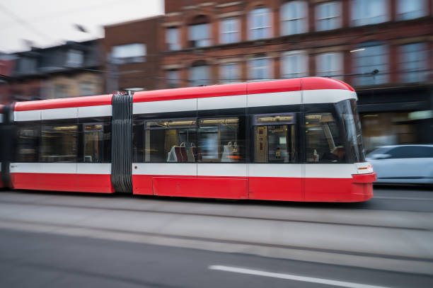 istock Red and white streetcar motion blur 2185483197
