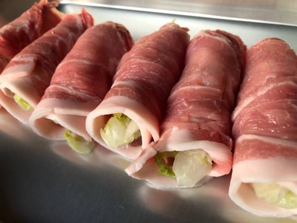 Enoki mushroom rolls, a savory bite of crispy enoki mushrooms wrapped in a delicate roll, offering a delightful mix of textures and flavors in every mouthful.