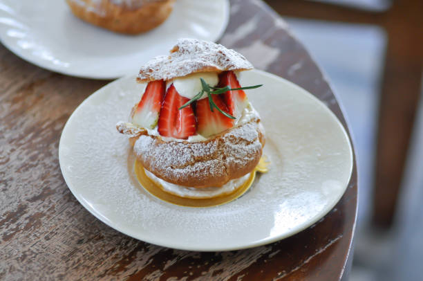 istock choux cream or cream puff, eclair or strawberry choux cream 2185490851