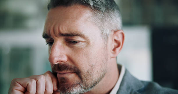 istock Doubt, ideas and mature man in office with thinking, business plan and brainstorming for solution. Frustrated, confused and face of businessman with brain fog, problem solving and risk management 2185496447