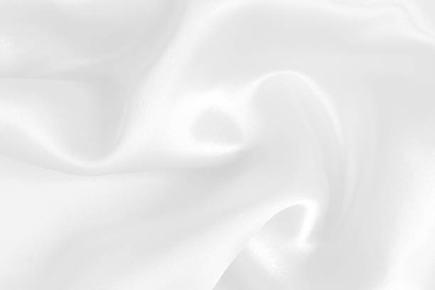 istock White fabric texture for background and design, beautiful pattern of silk or linen. 2185498424