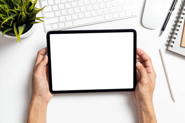 istock Mockup image tablet, businessman hand holding tablet pc with blank white screen 2185499270