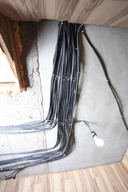 istock open wiring electrical wires grouped on the ceiling of a room 2185506978