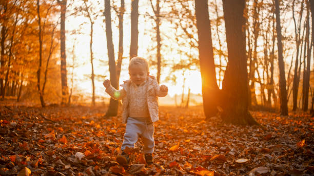 istock Autumn Adventure with Boy and Mother in Forest 2185513827