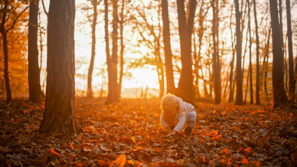 istock Autumn Bonding Time Mother and Son in Forest 2185513847