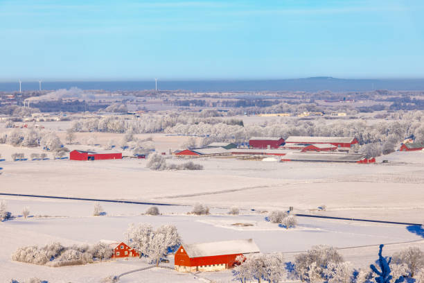istock Farms in a rural landscape view in the winter 2185516695