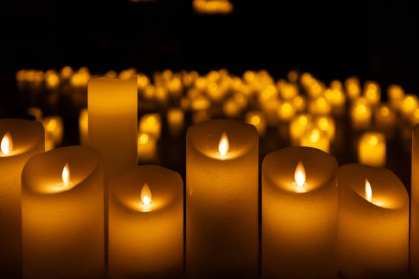 istock blurred symphonic orchestra on stage with lots of candles 2185523796
