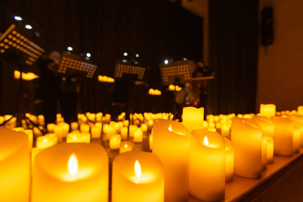 istock blurred symphonic orchestra on stage with lots of candles 2185525869