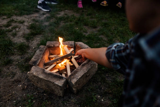 istock Cropped picture of hand make campfire in backyard. 2185526617