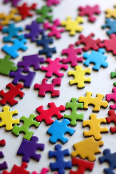 istock Colorful Jigsaw Puzzle Pieces 2185529591