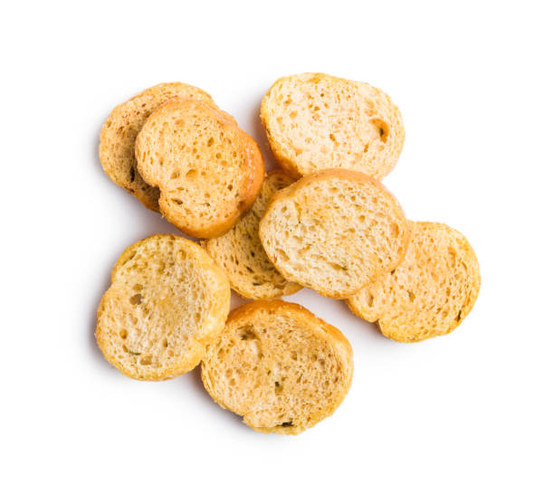 istock Sliced roasted bruschetta bread isolated on white background. 2185532296
