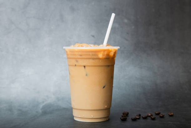 istock Iced of coffee cup on glass cup on marble background. 2185532739