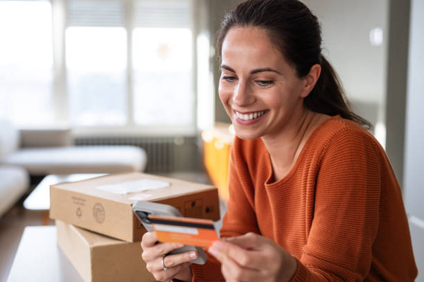 istock A young woman using a smart phone to shop online 2185534051