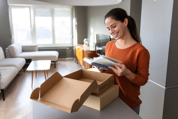 istock Pure joy of unboxing: Woman thrilled with her delivery 2185534085