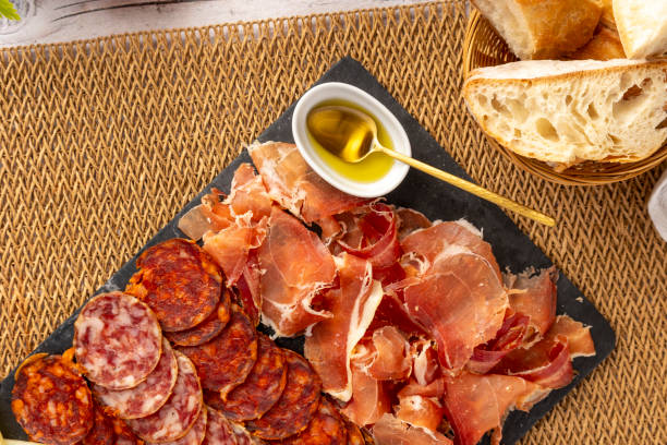 istock Delicious charcuterie board with cheese and bread. 2185534409