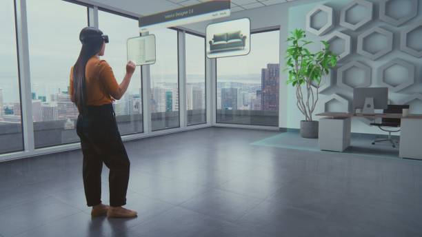 istock Asian female designer uses AR interior design app to arrange office workspace or apartment 2185536337