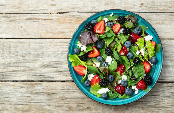 istock Berries salad (blueberry strawberry blackberry ) with cheese feta and balsamic sauce 2185537735