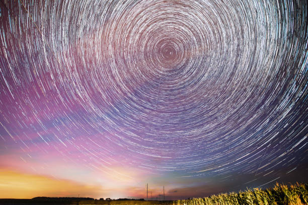 istock Soft Blue-orange-pink Colours. Amazing Star Trails On Night Sky 2185538919