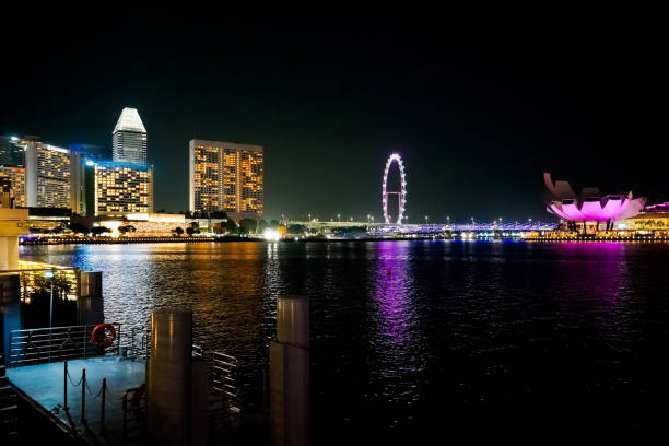 istock Singapore city skyline at night 2185541814