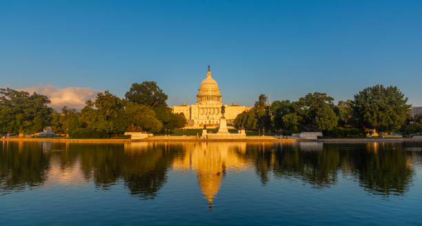 istock United States Capitol Building reflected on the pool's water 2185544427