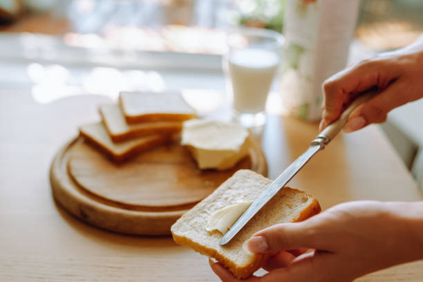 istock healthy breakfast milk bread and butter 2185545635