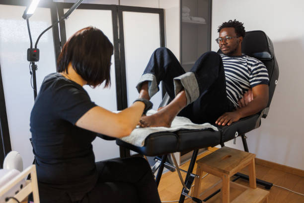 African man enjoying a pedicure treatment.