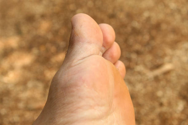 Close up of brown skinned man's legs