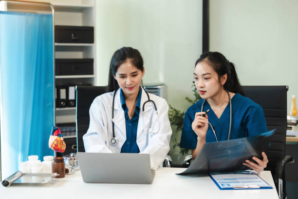 istock Medical team working on digital tablet healthcare doctor technology tablet using computer analyzed the results of medical reports at the hospital. 2185548235