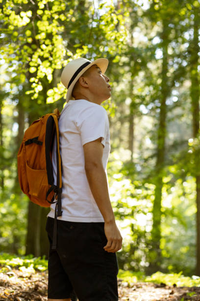 istock Tourist on a walk in the summer forest 2185549152