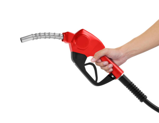 istock Hands holding Fuel red nozzle with hose isolated on white background 2185552812