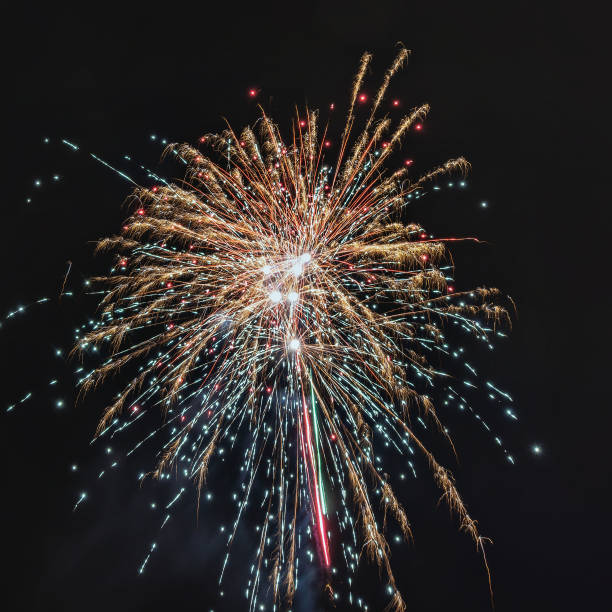istock Vibrant Fireworks Lighting Up the Night Sky in a Spectacular Display 2185553119