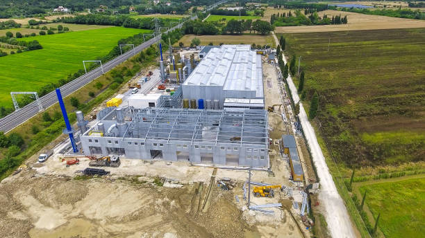 istock Early Construction Phase with Workers and Equipment on Site 2185553359