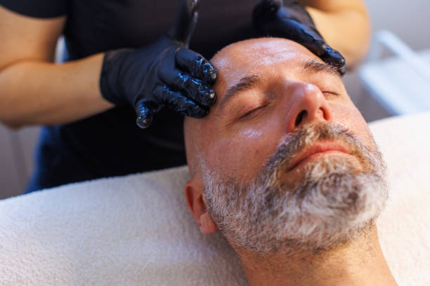 istock Man At Beauty Spa Treatment 2185553578
