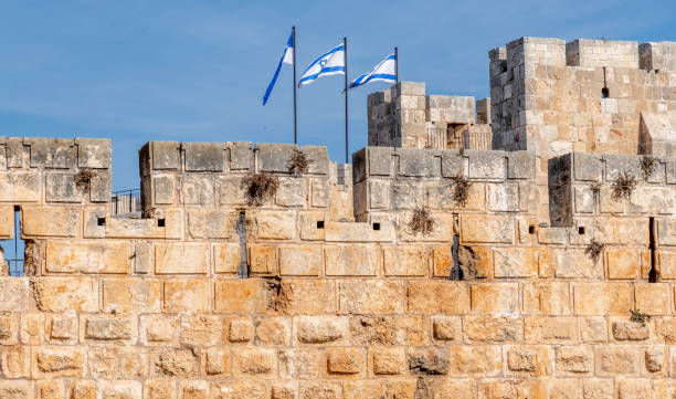 istock Flags flying in the wind at Old Town Jerusalem 2185555276