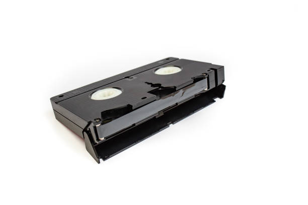 istock Video recorder tape isolated on white background, perspective close up 2185566247