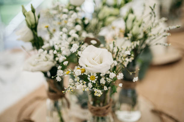 istock Rustic Wedding Centerpiece with White Rose and Baby's Breath 2185567008