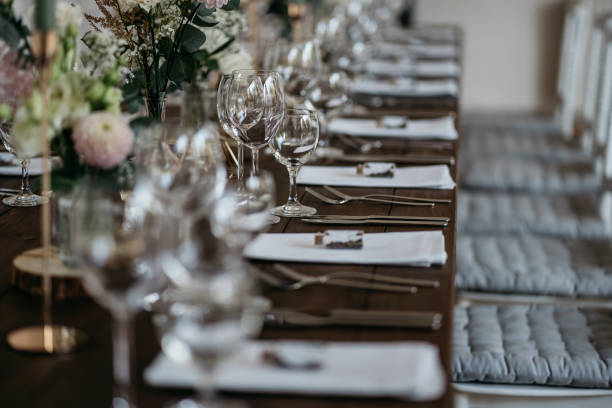 istock Elegant Wedding Table Setting with Wine Glasses and Floral Decorations 2185567161