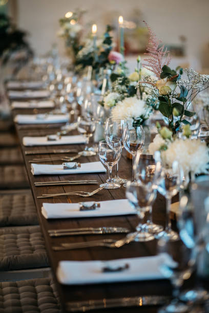 istock Elegant Wedding Table Setting with Wine Glasses and Floral Decorations 2185567170
